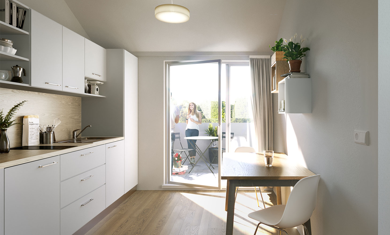 Küche mit kleinem Esstisch und Blick auf den Balkon