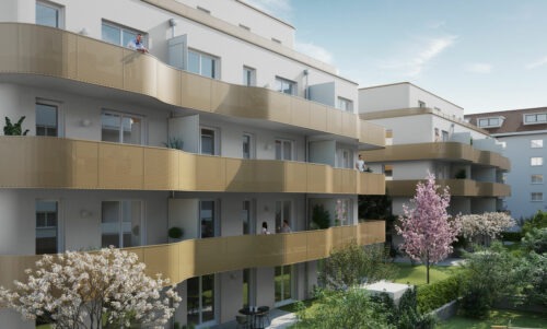 Die Wohnanlage Jägerstraße 30 mit Balkonen und Garten.